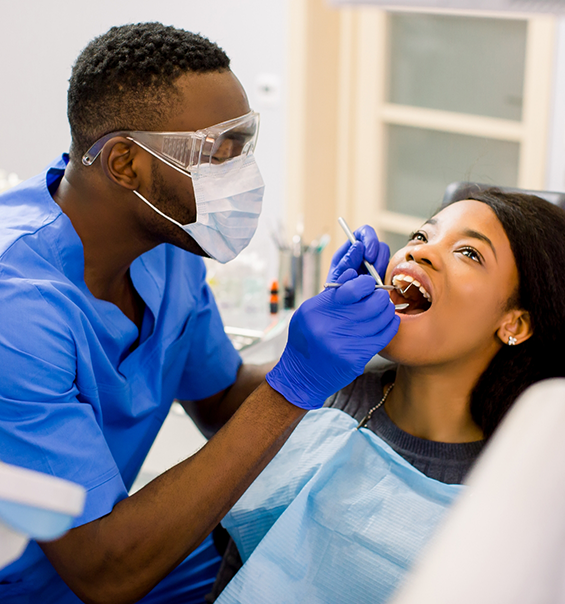 Patient having their mouth examined by a dentist