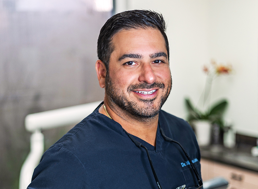 West Palm Beach dentist Doctor Mihran Asinmaz smiling