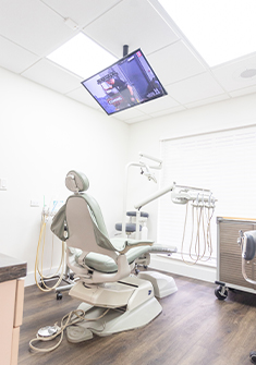 Pristine dental treatment room with white walls