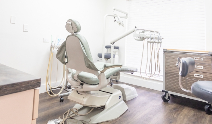 Dental exam room with white walls