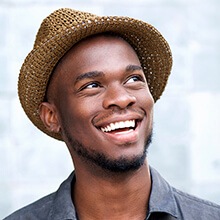 Man with bright smile after tooth colored fillings