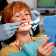 Woman in the dental chair for smile makeover